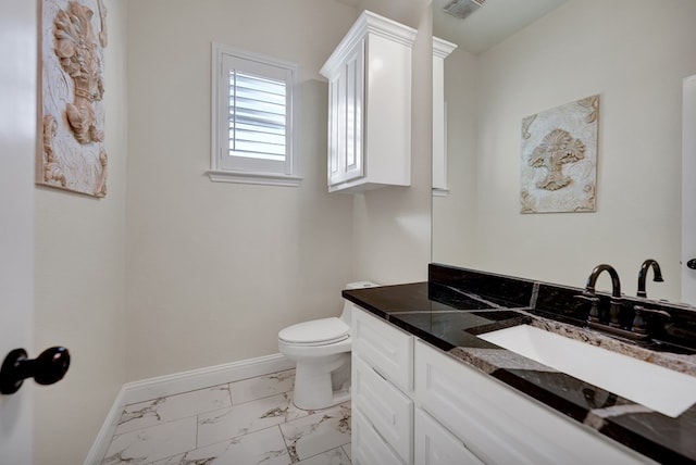 bathroom with visible vents, baseboards, toilet, marble finish floor, and vanity