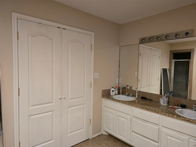 bathroom with vanity and tile patterned floors