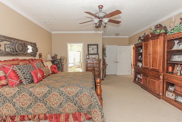 bedroom featuring light carpet, ensuite bathroom, ceiling fan, ornamental molding, and a textured ceiling