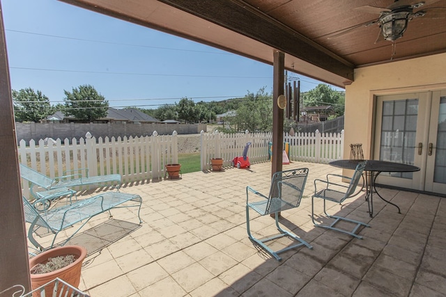 view of patio with ceiling fan and french doors