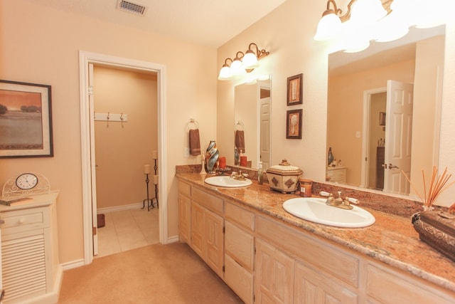 bathroom featuring vanity and tile patterned floors