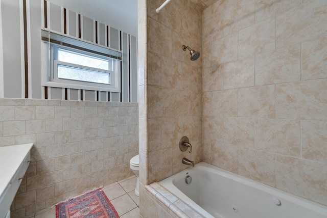 full bath with vanity, toilet, tile walls, shower / bathing tub combination, and tile patterned floors