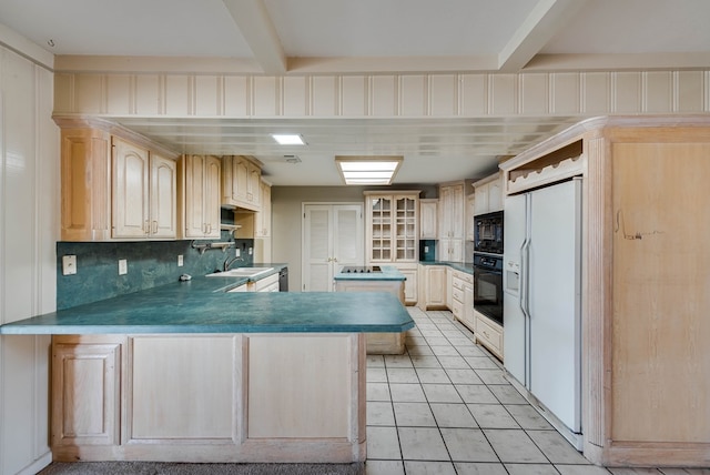 kitchen featuring a peninsula, light brown cabinets, light tile patterned floors, backsplash, and black appliances