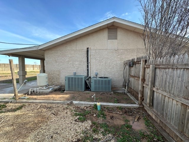 view of home's exterior featuring central air condition unit