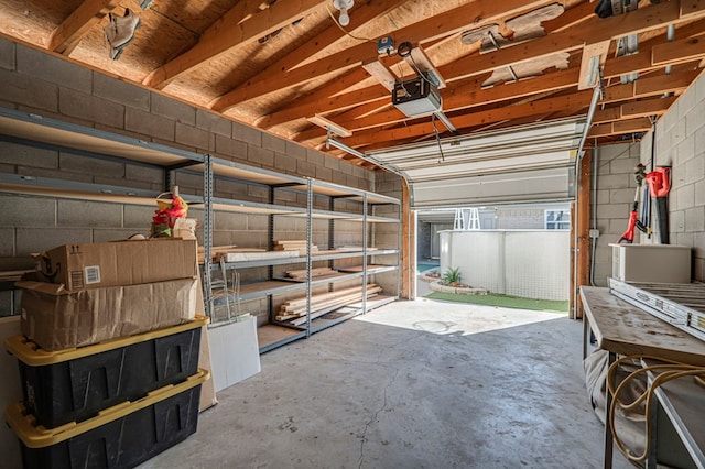 garage featuring a garage door opener