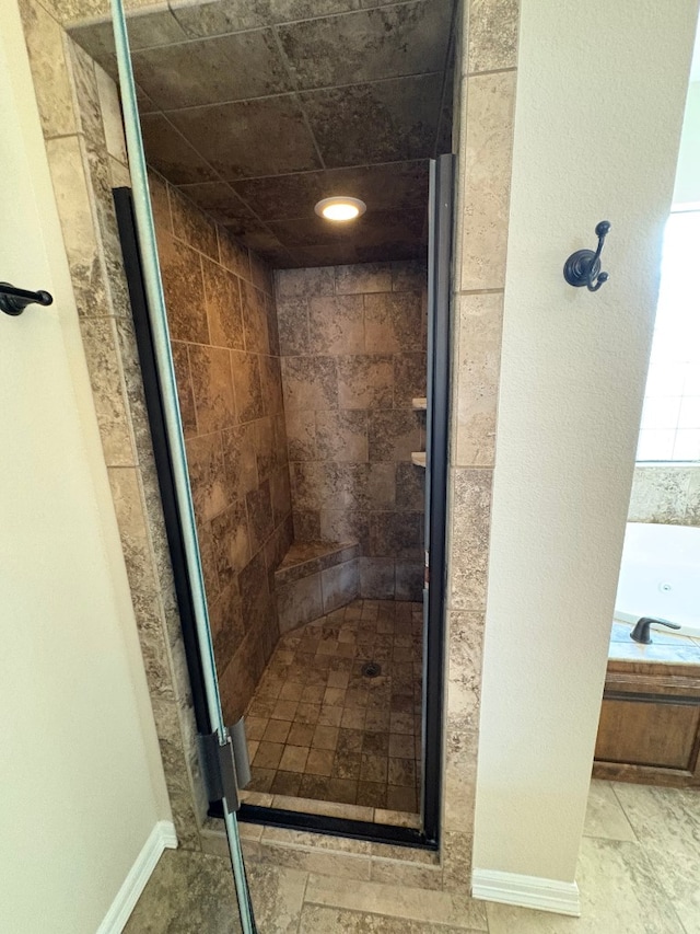 bathroom featuring plus walk in shower