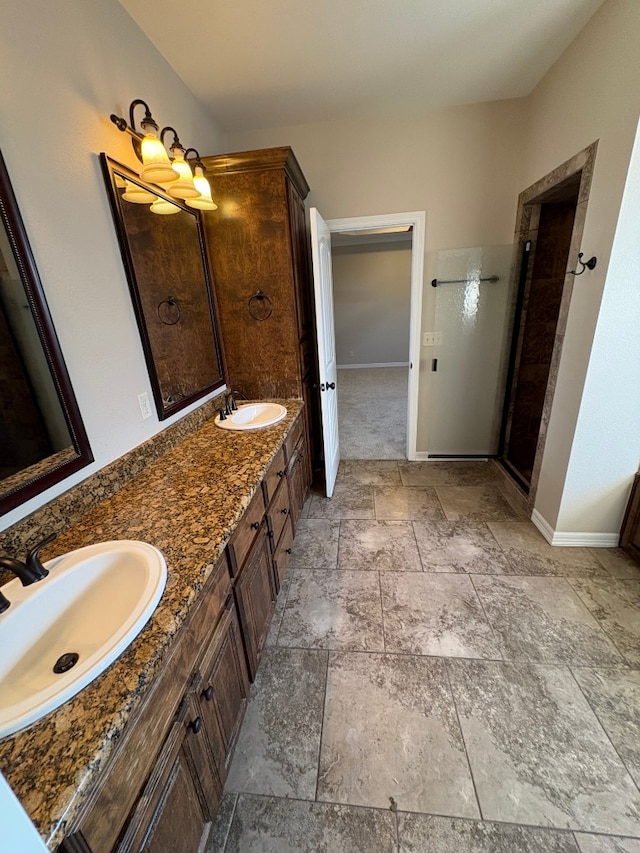 bathroom with an enclosed shower and vanity