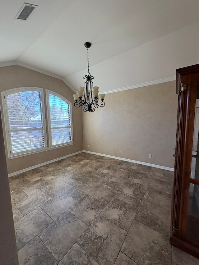 unfurnished dining area featuring an inviting chandelier and vaulted ceiling