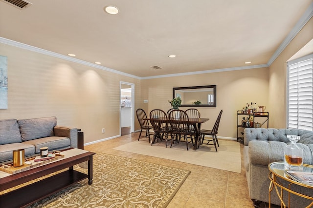 living room with crown molding and light tile patterned flooring