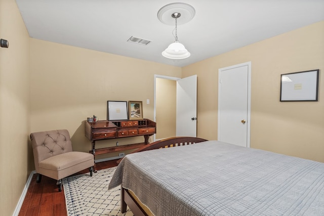 bedroom featuring hardwood / wood-style floors