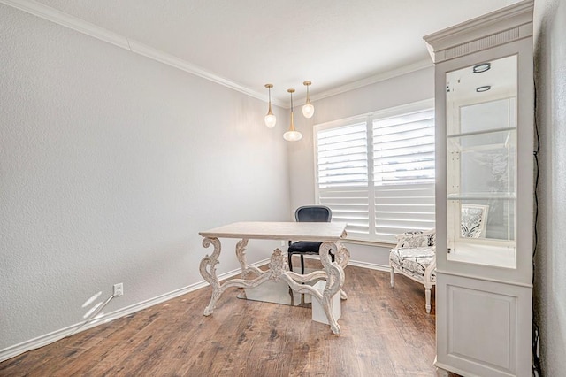 home office with crown molding and dark wood-type flooring