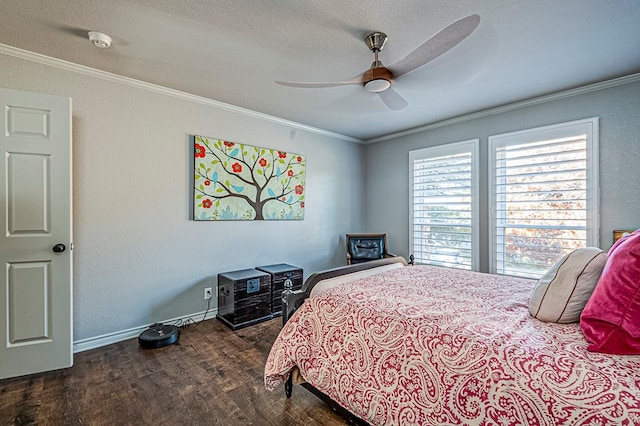 bedroom with ceiling fan, crown molding, and dark wood-type flooring