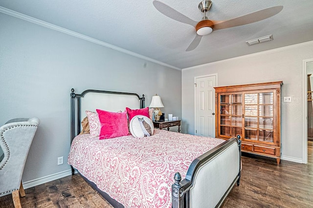 bedroom with ceiling fan, dark hardwood / wood-style floors, and ornamental molding