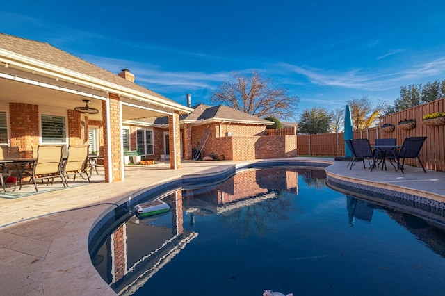 view of pool featuring a patio area