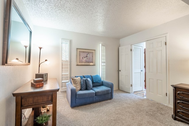 1115 Gulf Ave, Midland, TX 79705 - sitting room featuring carpet and a textured ceiling