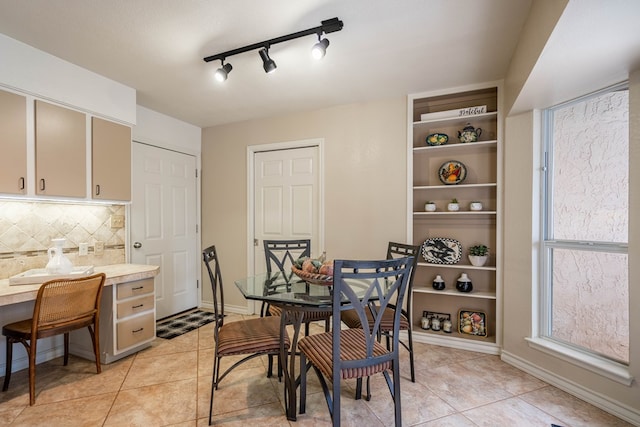 1115 Gulf Ave, Midland, TX 79705 - dining space with light tile patterned floors