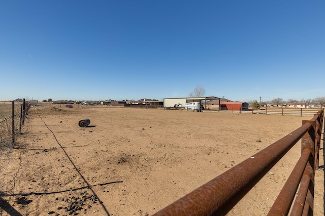 view of yard featuring a rural view