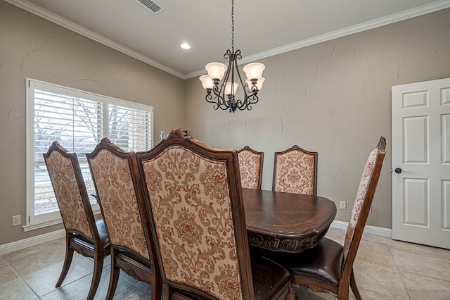 dining space with ornamental molding, a healthy amount of sunlight, a notable chandelier, and visible vents