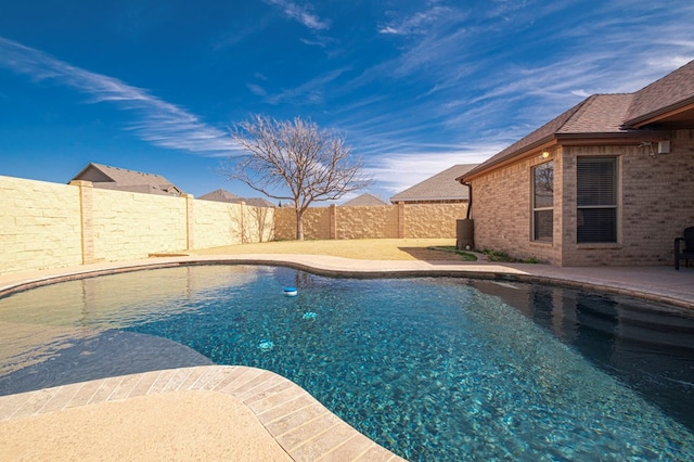 view of pool featuring a fenced in pool, a fenced backyard, and a patio