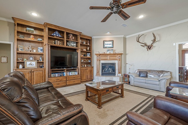 living room with recessed lighting, a premium fireplace, a ceiling fan, visible vents, and crown molding