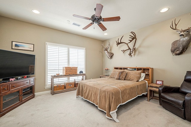 bedroom featuring recessed lighting, light carpet, a ceiling fan, baseboards, and visible vents