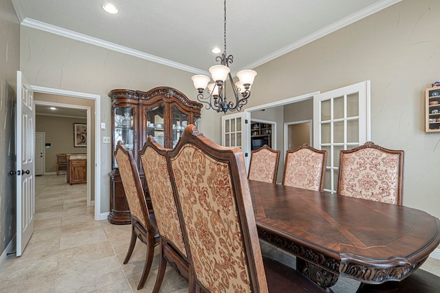 dining area with a chandelier and crown molding