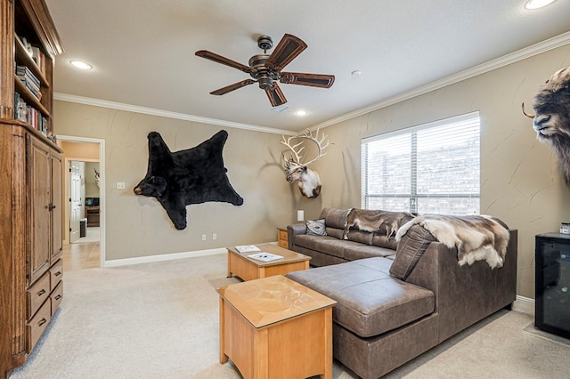 living area featuring baseboards, a ceiling fan, light colored carpet, crown molding, and recessed lighting