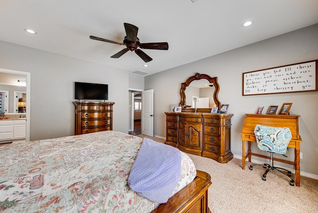 carpeted bedroom with recessed lighting, a ceiling fan, baseboards, and ensuite bathroom