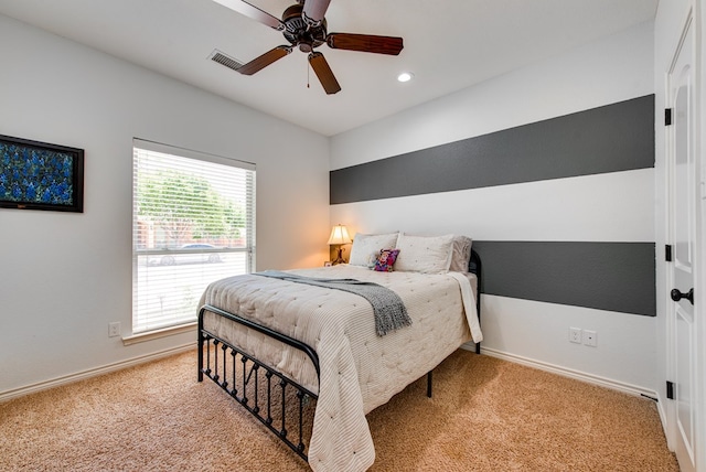 carpeted bedroom with recessed lighting, visible vents, baseboards, and ceiling fan