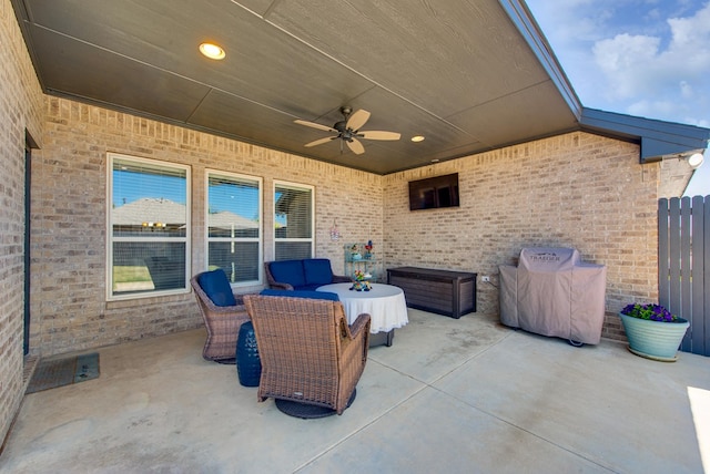 view of patio / terrace with a ceiling fan and an outdoor hangout area