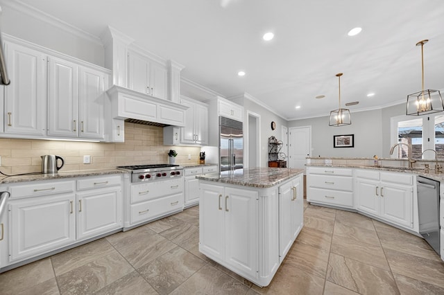 1102 Silverton Dr, Midland, TX 79705 - kitchen featuring stainless steel appliances, recessed lighting, crown molding, decorative backsplash, and white cabinets