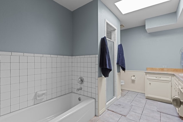 2821 Goddard Pl, Midland, TX 79705 - full bath featuring a garden tub, tile patterned flooring, toilet, vanity, and baseboards