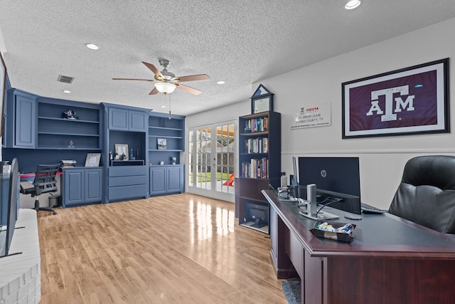 2821 Goddard Pl, Midland, TX 79705 - home office with a textured ceiling, ceiling fan, light wood-style flooring, and recessed lighting