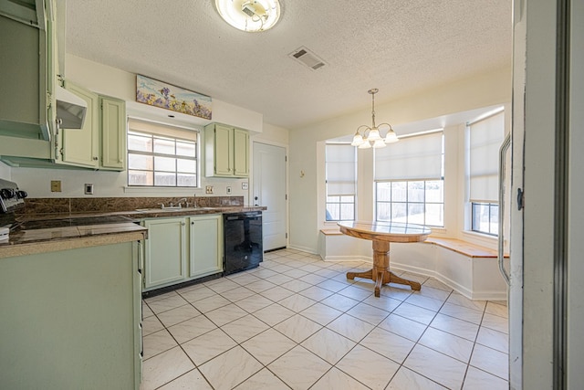 kitchen featuring visible vents, a sink, black dishwasher, green cabinets, and dark countertops