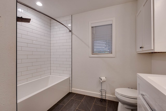 709 21st St, Lamesa, TX 79331 - bathroom with vanity, shower / tub combination, tile patterned floors, and recessed lighting