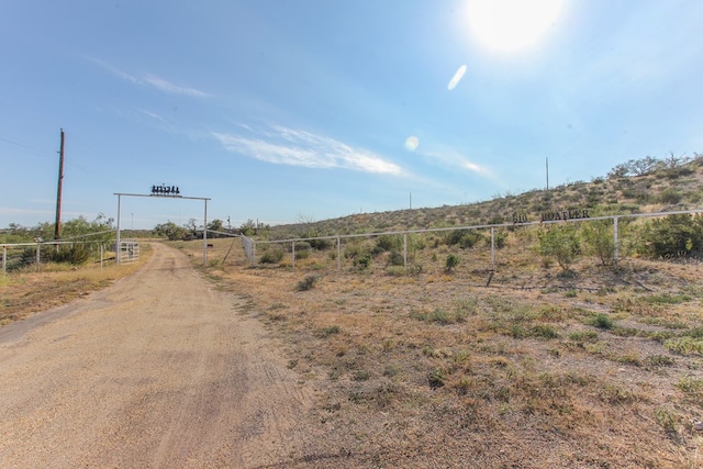 view of street featuring a rural view