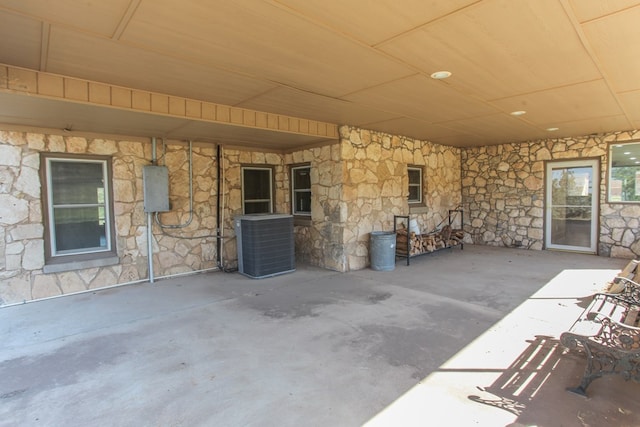 view of patio / terrace with electric panel and cooling unit