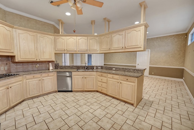 kitchen featuring crown molding, dark stone countertops, sink, and light brown cabinets