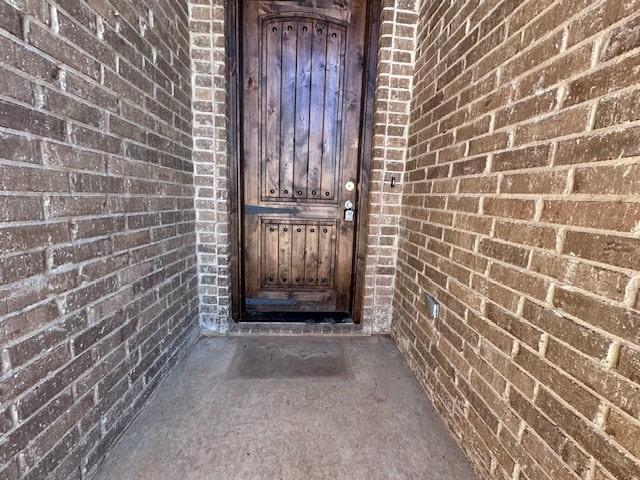 3210 Fordham Ave, Big Spring, TX 79720 - doorway to property with brick siding