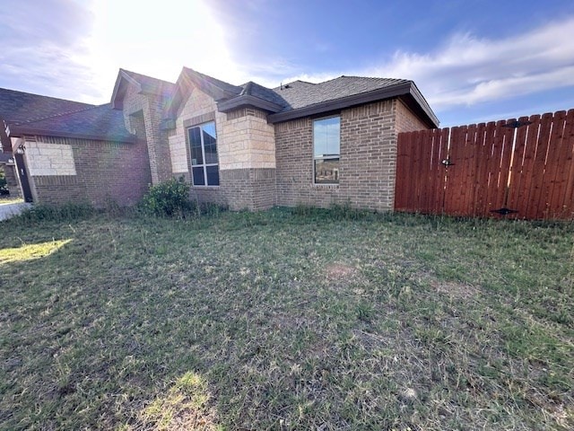 3210 Fordham Ave, Big Spring, TX 79720 - view of side of property featuring brick siding