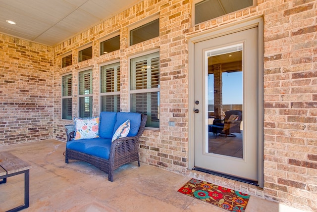 entrance to property with brick siding