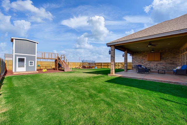 1602 S County Rd 1069, Midland, TX 79706 - view of yard featuring a playground, a patio, and a ceiling fan
