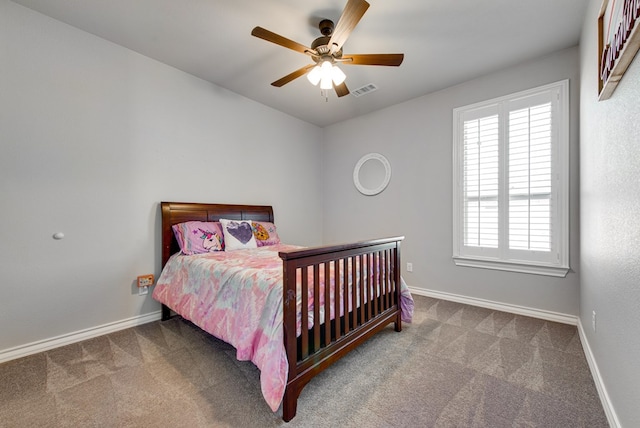 bedroom featuring visible vents, carpet, baseboards, and ceiling fan