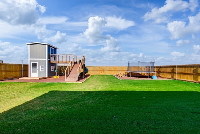 1602 S County Rd 1069, Midland, TX 79706 - view of yard featuring a trampoline