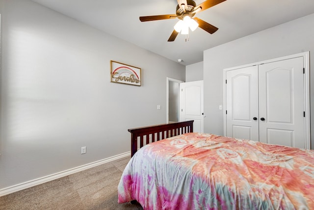 bedroom featuring a closet, ceiling fan, baseboards, and carpet floors