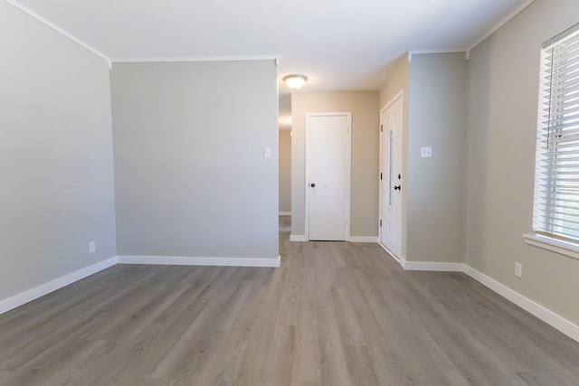 3319 Maxwell Dr, Midland, TX 79705 - empty room with wood finished floors and crown molding