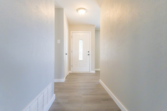 3319 Maxwell Dr, Midland, TX 79705 - entryway featuring light wood finished floors and baseboards