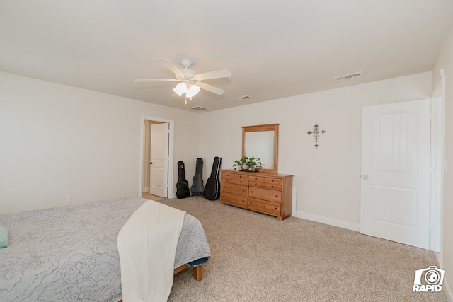 bedroom featuring ceiling fan and light carpet