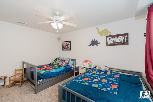 carpeted bedroom featuring ceiling fan