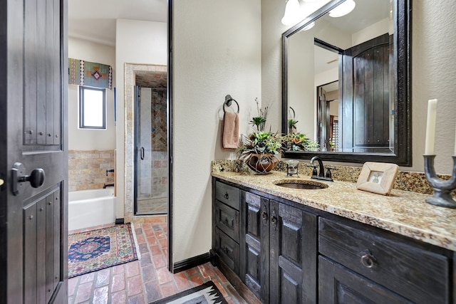 bathroom featuring vanity, brick flooring, a stall shower, and a garden tub